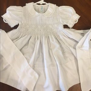 18m White Smocked dress by Feldman Bros. Photos.